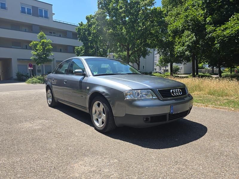 Grau Gebraucht 1997 Audi A6 Limousine | 2.300 € - Bild 1/4