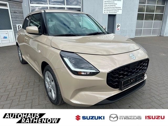 Beige Neu 2025 Suzuki Swift Comfort+ Limousine | 20.890 € - Bild 1/4