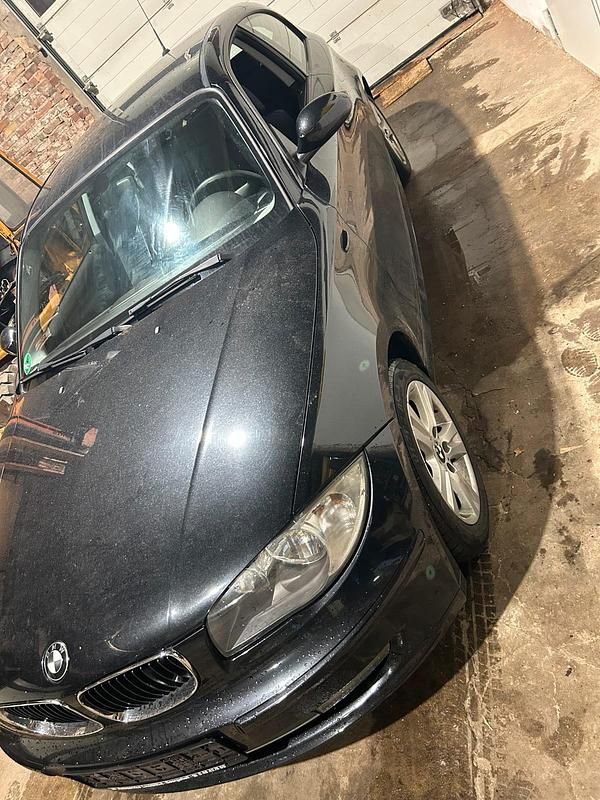 Second-hand BMW 116 122 CP (89 kW) 2009 Negru Hatchback