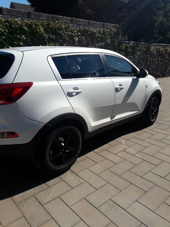 Weiß Gebraucht 2014 Kia Sportage Spirit SUV | 7.950 € (Guter Preis) - Bild 1/4