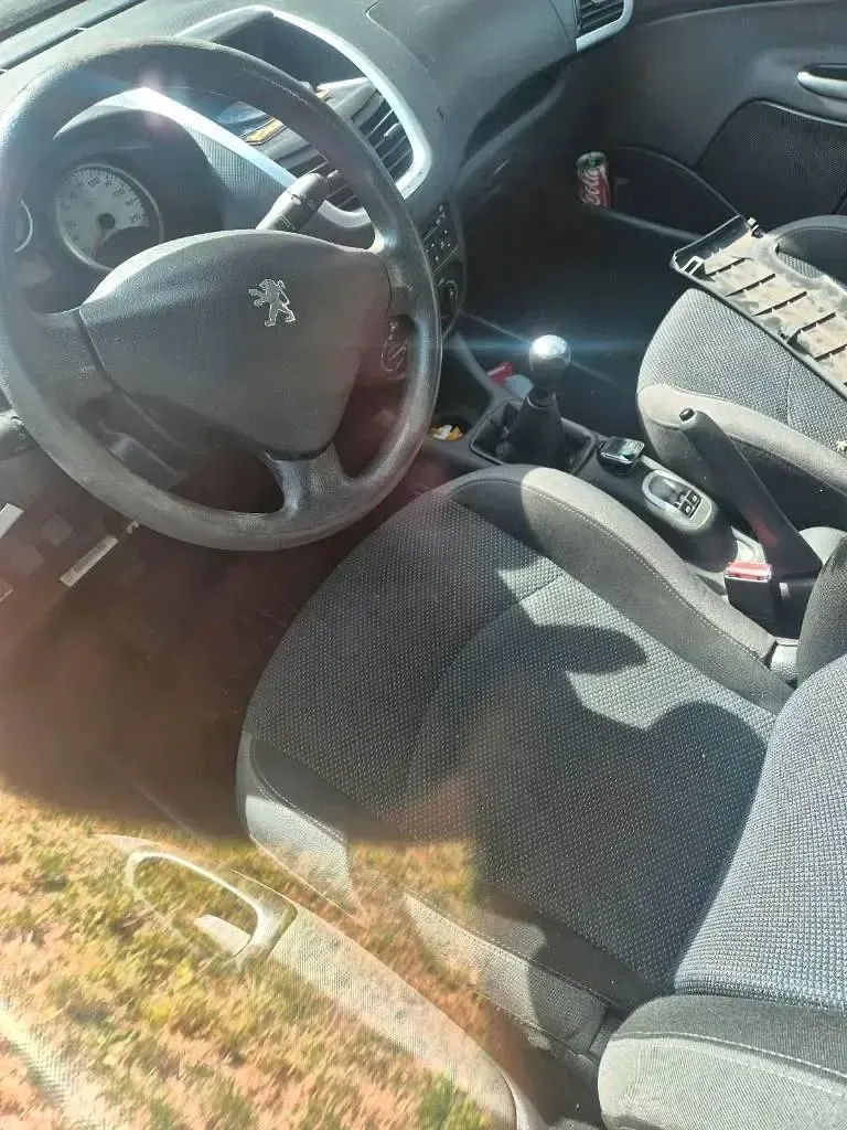 Gebraucht Peugeot 206+ 77 PS (56 kW) 2009 Grau Kleinwagen