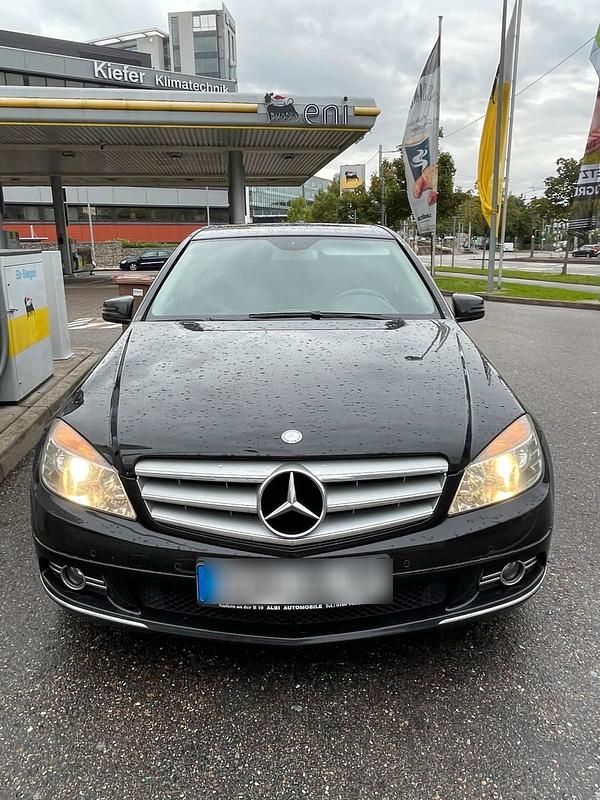 Schwarz Gebraucht 2010 Mercedes C200 Limousine | 7.099 € - Bild 1/4