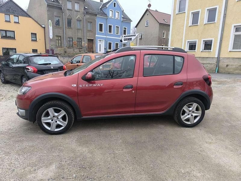 Orange Gebraucht 2014 Dacia Sandero Prestige Kleinwagen | 6.499 € (Fairer Preis) - Bild 1/4