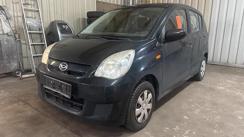 Schwarz Gebraucht 2011 Daihatsu Cuore Kleinwagen | 599 € (Superpreis) - Bild 1/4