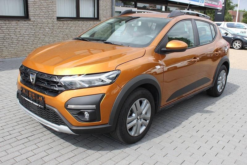 Atacamaorange Gebraucht 2021 Dacia Sandero Comfort Kleinwagen | 12.490 € (Guter Preis) - Bild 1/4