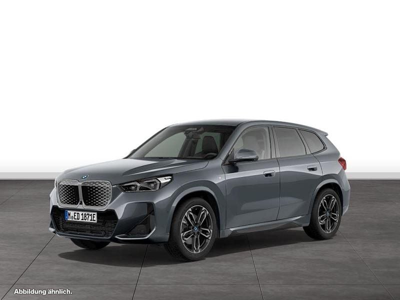 Storm bay metallic Gebraucht 2024 BMW iX1 Comfort Edition SUV | 53.824 € - Bild 1/4