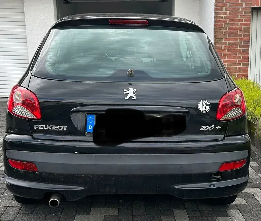 Używany Peugeot 206 75 KM (55 kW) 2009 Czarny Sedan/Limuzyna