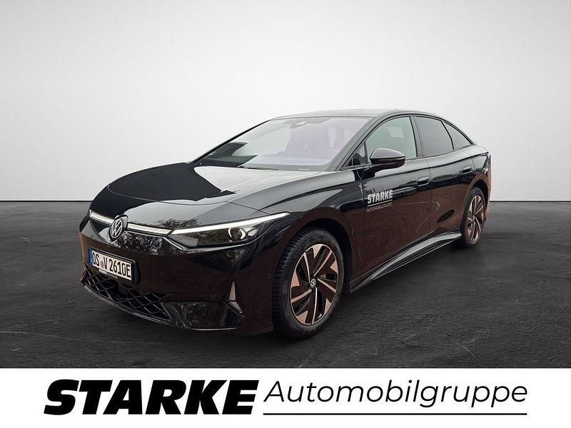 Schwarz (grenadillschwarz metallic) Gebraucht 2025 VW ID.7 GTX Kleinwagen | 63.930 € - Bild 1/4