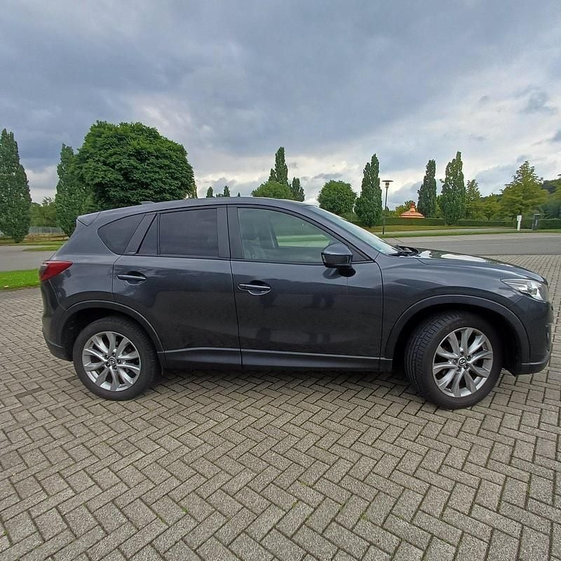 Grau Gebraucht 2015 Mazda CX-5 Inclusive SUV | 12.750 € (Fairer Preis) - Bild 1/4