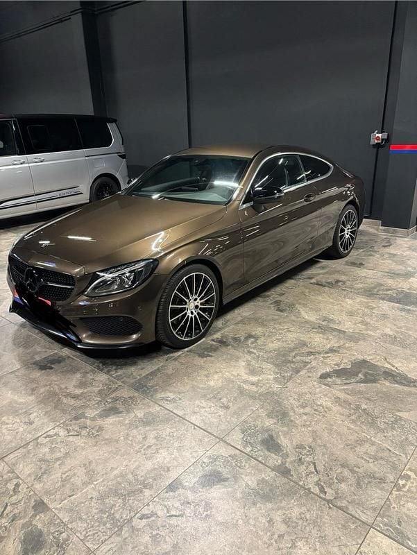Braun Gebraucht 2016 Mercedes C200 AMG line Coupé | 17.990 € (Fairer Preis) - Bild 1/4