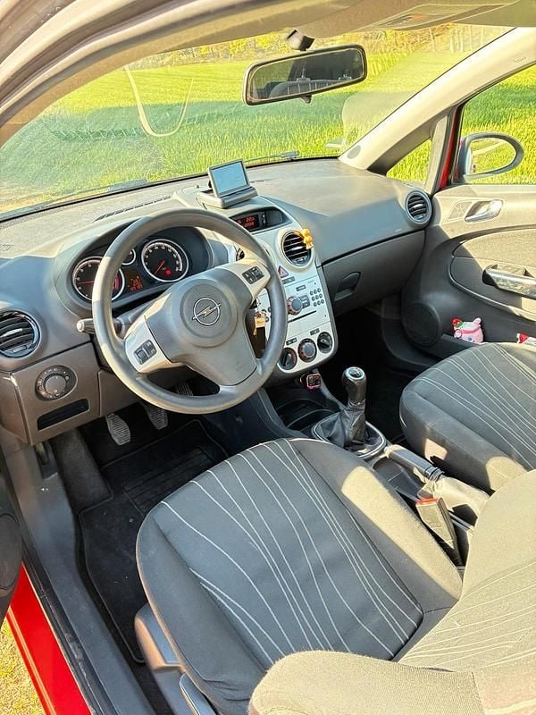 Second-hand Opel Corsa 80 CP (58 kW) 2009 Roșu Hatchback