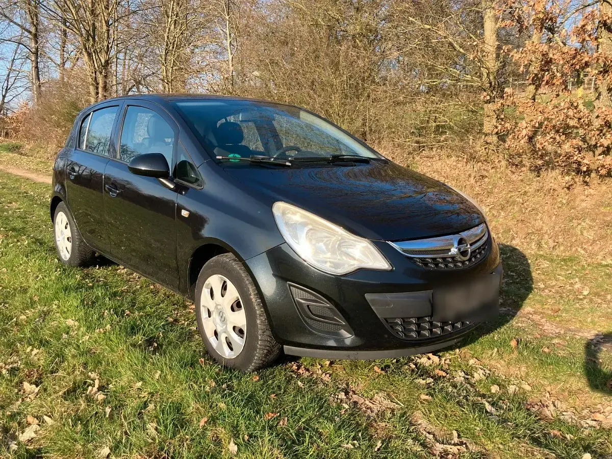 Gebraucht Opel Corsa Active 75 PS (55 kW) 2013 Schwarz Kleinwagen