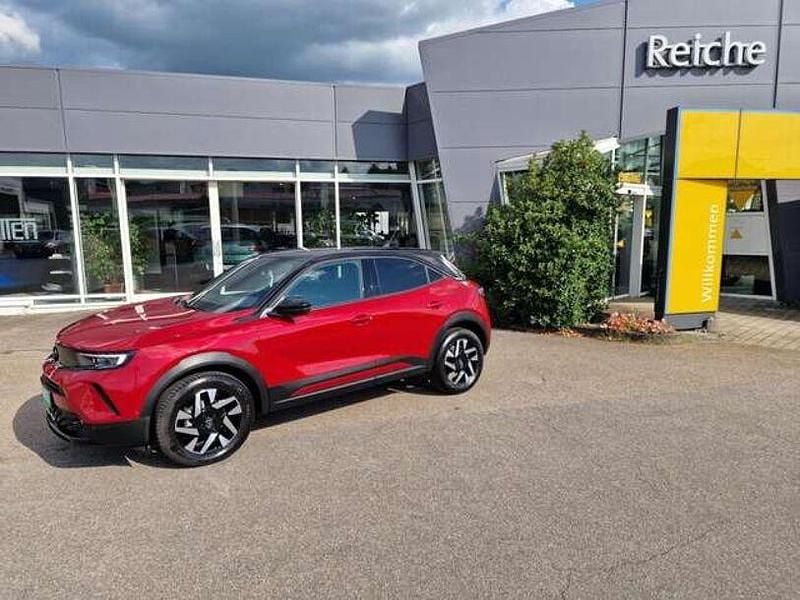 Kosmosrot (metallic) Gebraucht 2024 Opel Mokka Ultimate SUV | 24.990 € (Fairer Preis) - Bild 1/4