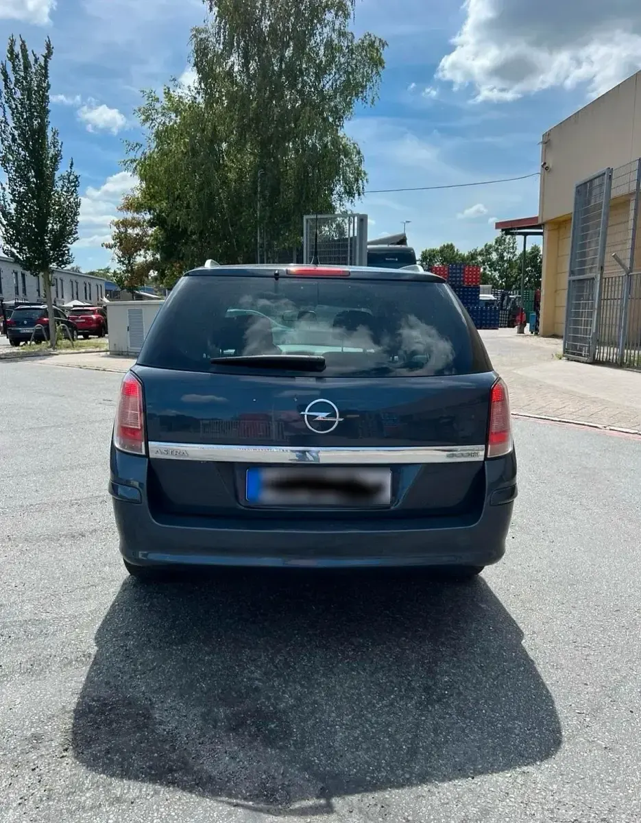 Gebraucht Opel Astra 90 PS (66 kW) 2010 Blau Kombi