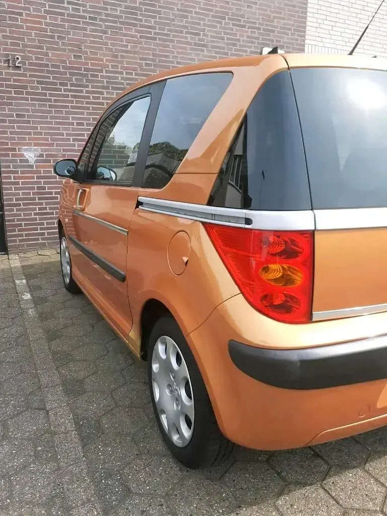 Gebraucht Peugeot 1007 73 PS (53 kW) 2006 Orange Van / Kleinbus