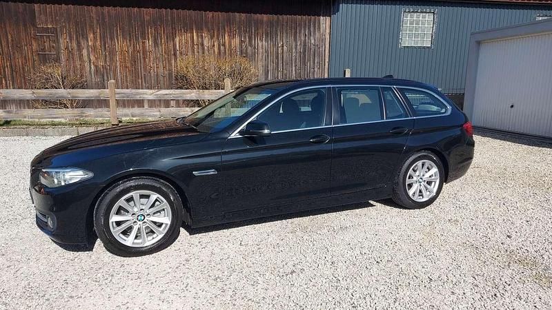 Gebraucht BMW 520 184 PS (135 kW) 2014 Black sapphire metallic Kombi