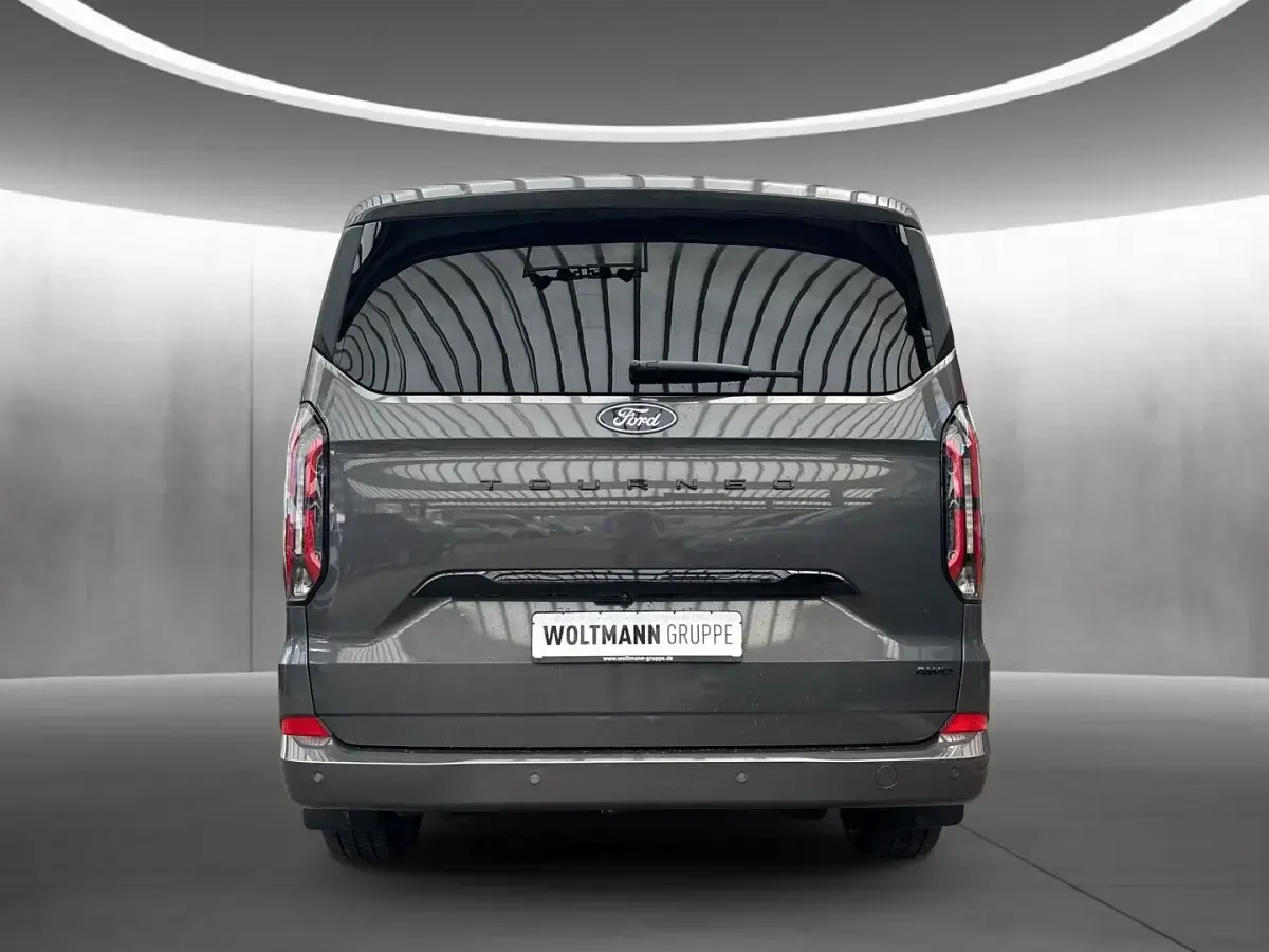 Gebraucht Ford Tourneo Custom Titanium X 170 PS (125 kW) 2025 Magneticgrau (metallic) Van