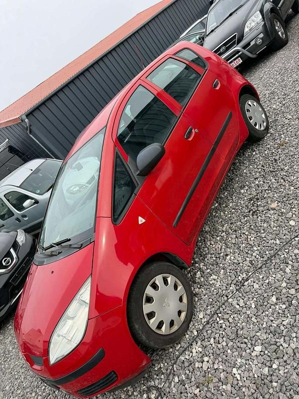 Gebraucht Mitsubishi Colt 75 PS (55 kW) 2007 Rot Kleinwagen