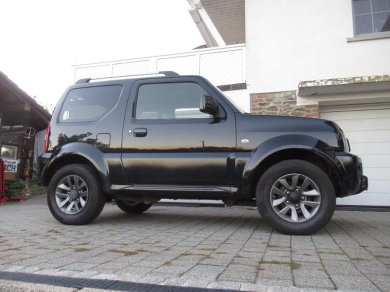 Schwarz Gebraucht 2017 Suzuki Jimny Style SUV | 12.350 € (Guter Preis) - Bild 1/4