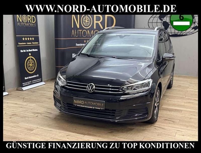 Schwarz Gebraucht 2023 VW Touran Active Van / Kleinbus | 28.900 € (Fairer Preis) - Bild 1/3