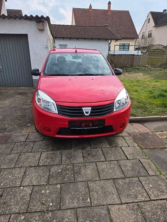 Rot Gebraucht 2009 Dacia Sandero Ambiance Kleinwagen | 800 € (Superpreis) - Bild 1/4