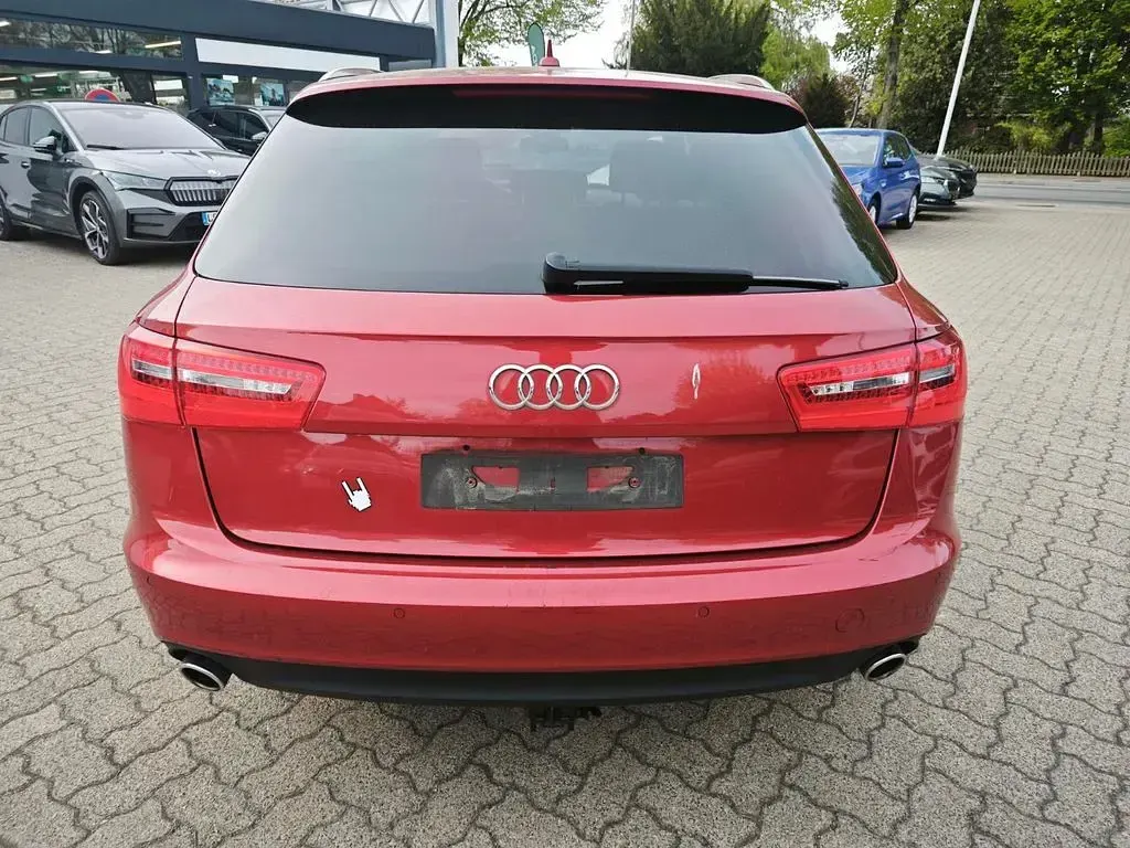 Używany Audi A6 245 KM (180 kW) 2011 Czerwony Kombi