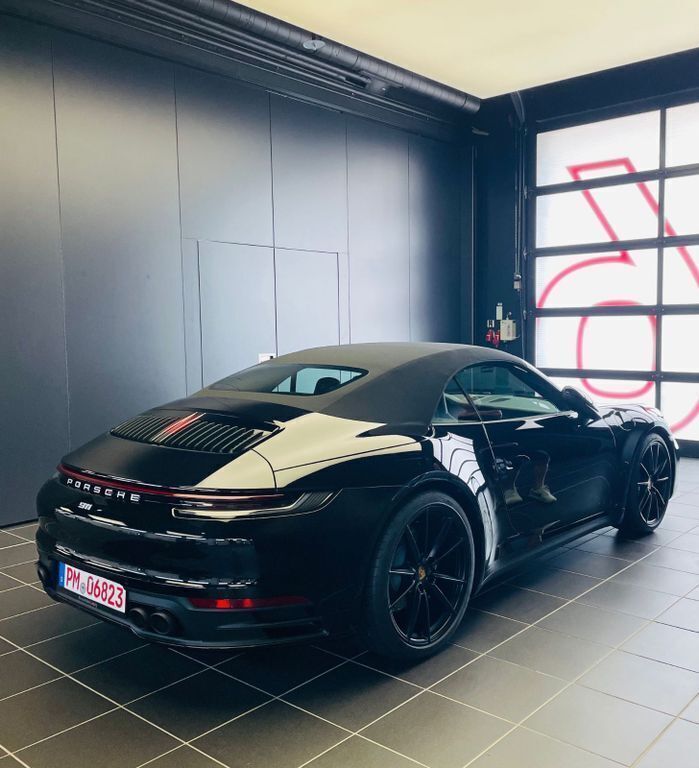 Schwarz Gebraucht 2023 Porsche 992 Cabrio | 128.900 € (Superpreis) - Bild 1/4
