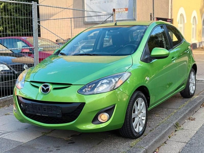 Grün Gebraucht 2011 Mazda 2 Active Kleinwagen | 4.490 € (Fairer Preis) - Bild 1/4