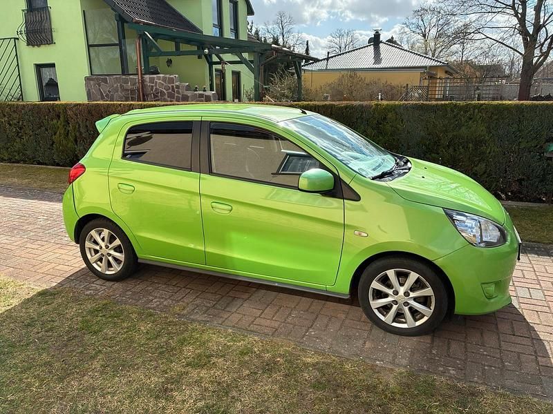 Gebraucht Mitsubishi Space Star 71 PS (52 kW) 2013 Grün Van / Kleinbus