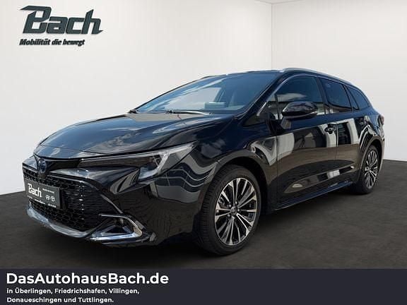 Mysticschwarz mica Gebraucht 2024 Toyota Corolla Team Kombi | 32.230 € (Fairer Preis) - Bild 1/4