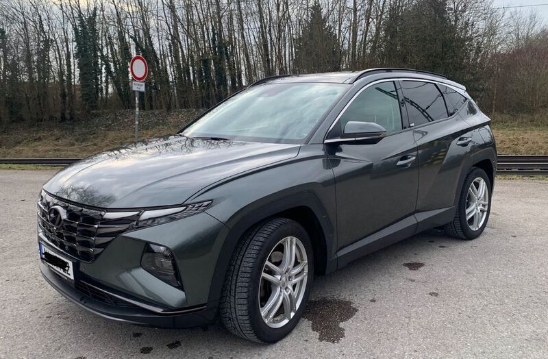Grau Gebraucht 2021 Hyundai Tucson Prime SUV | 29.500 € (Teuer) - Bild 1/4