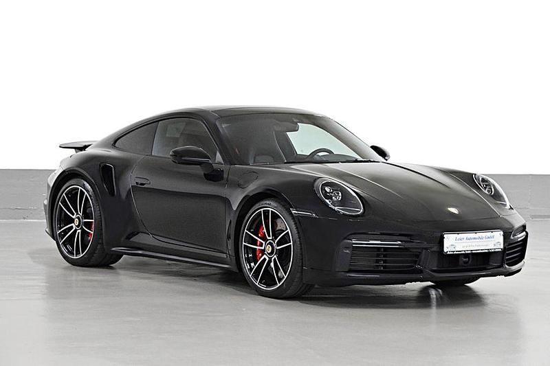 Tiefschwarzmetallic Gebraucht 2021 Porsche 992 Coupé | 199.990 € - Bild 1/4