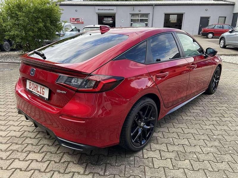 Gebraucht Honda Civic Hybrid 143 PS (105 kW) 2024 Premium crystal rot metallic Limousine