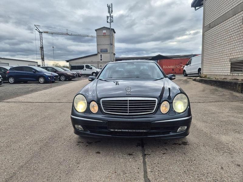 Second-hand Mercedes E200 163 CP (119 kW) 2004 Negru Berlinǎ