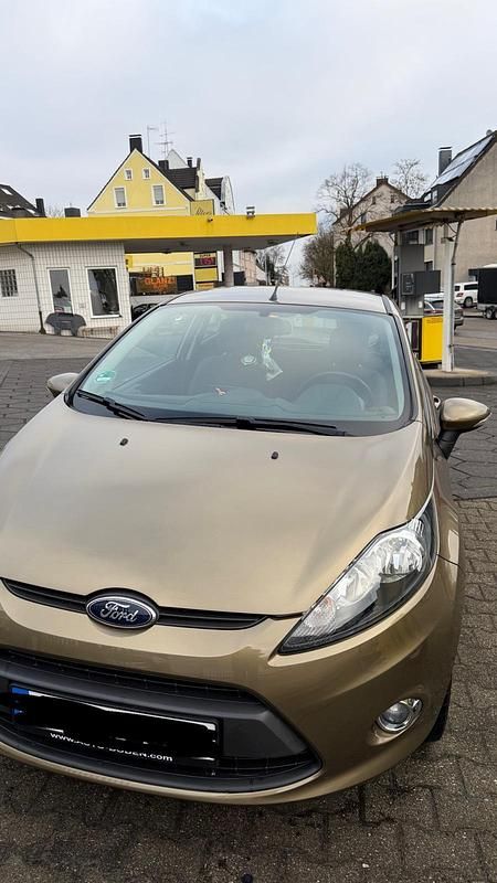 Gebraucht Ford Fiesta 85 PS (62 kW) 2012 Gold Kleinwagen