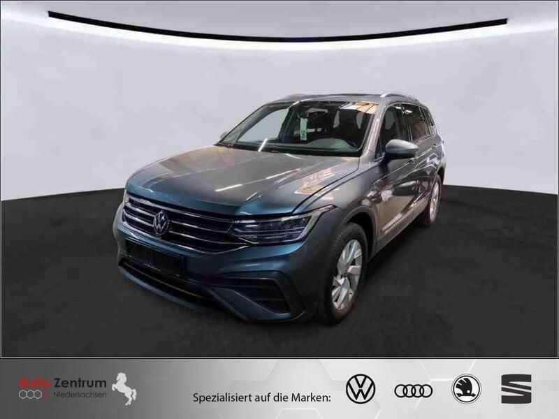 Grau Gebraucht 2022 VW Tiguan Allspace Life SUV | 32.469 € (Superpreis) - Bild 1/4