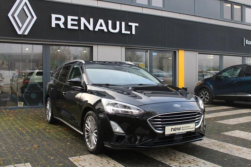 Gebraucht Ford Focus Titanium 125 PS (91 kW) 2019 Iridiumschwarz Kombi