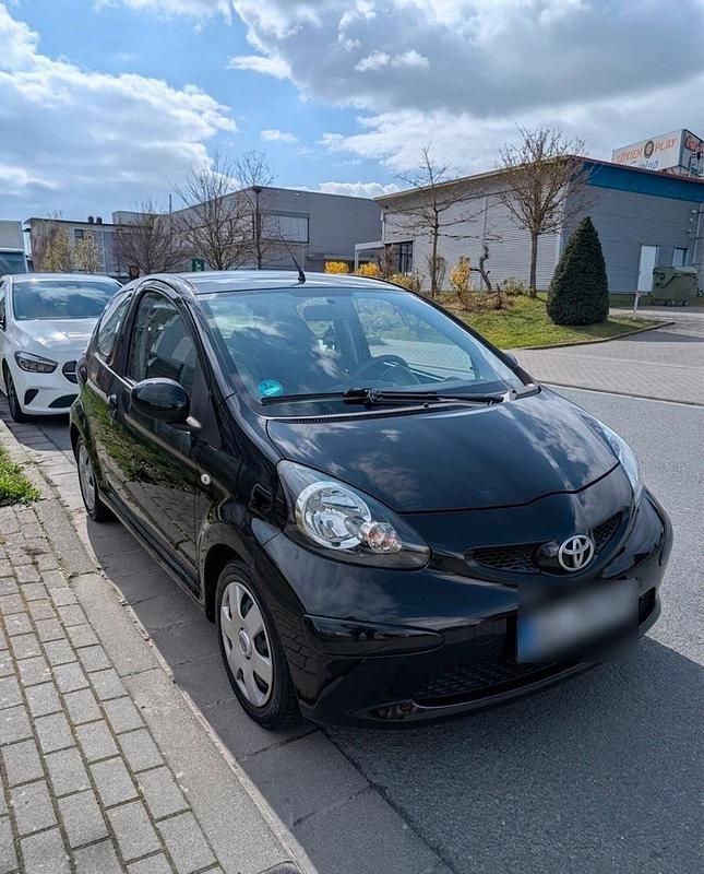 Gebraucht Toyota Aygo 68 PS (50 kW) 2007 Schwarz Kleinwagen
