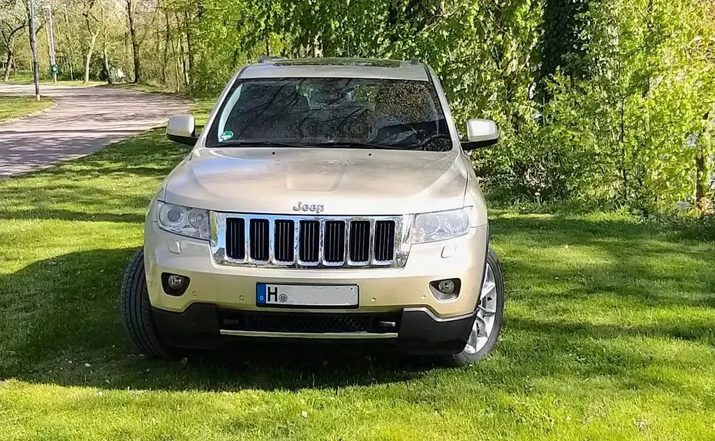 Gebraucht Jeep Grand Cherokee 241 PS (177 kW) 2013 Gold SUV