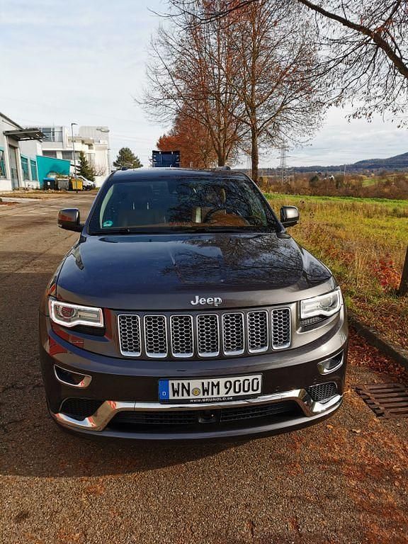 Grau Gebraucht 2016 Jeep Grand Cherokee Summit SUV | 27.000 € (Fairer Preis) - Bild 1/4