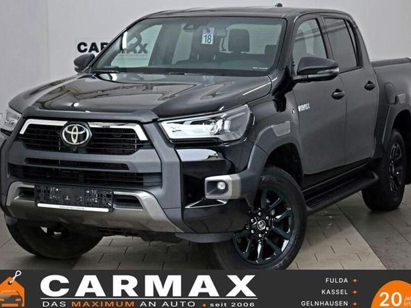 Attitude black mc. (metallic) Gebraucht 2024 Toyota HiLux Abholung | 53.800 € (Teuer) - Bild 1/4