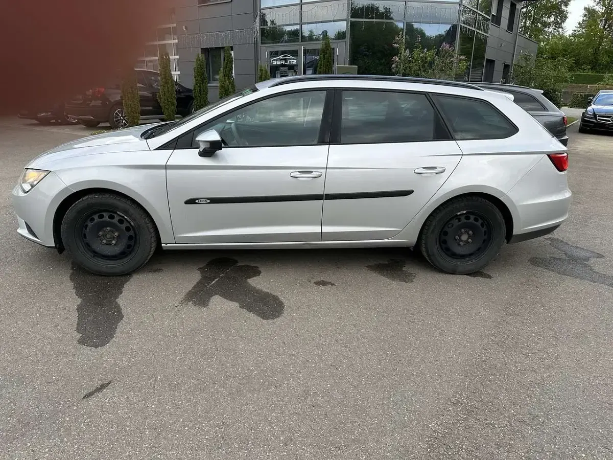 Używany Seat Leon ST Reference 110 KM (80 kW) 2015 Srebrny Kombi