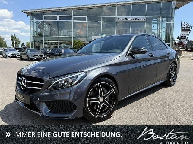 Grau (metallic) Gebraucht 2016 Mercedes C180 AMG Limousine | 21.900 € (Teuer) - Bild 1/4