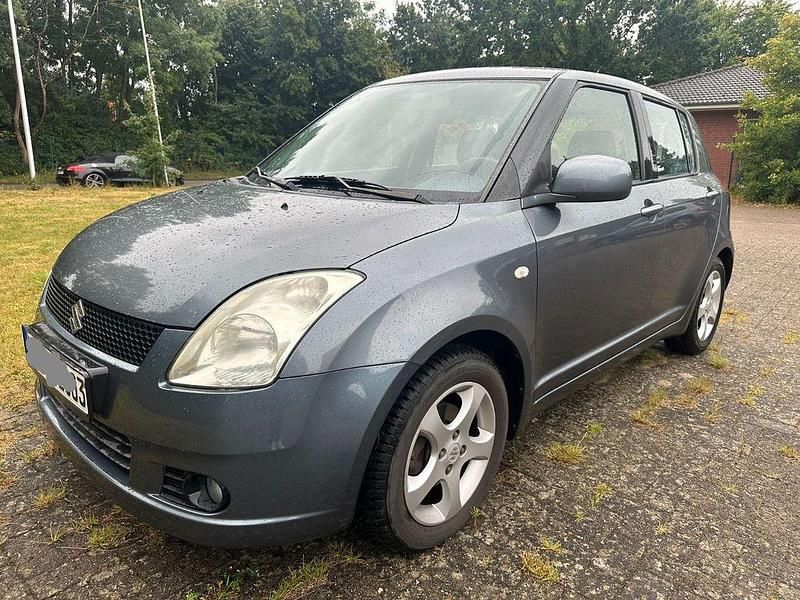 Grau Gebraucht 2007 Suzuki Swift Comfort Limousine | 2.499 € (Guter Preis) - Bild 1/4