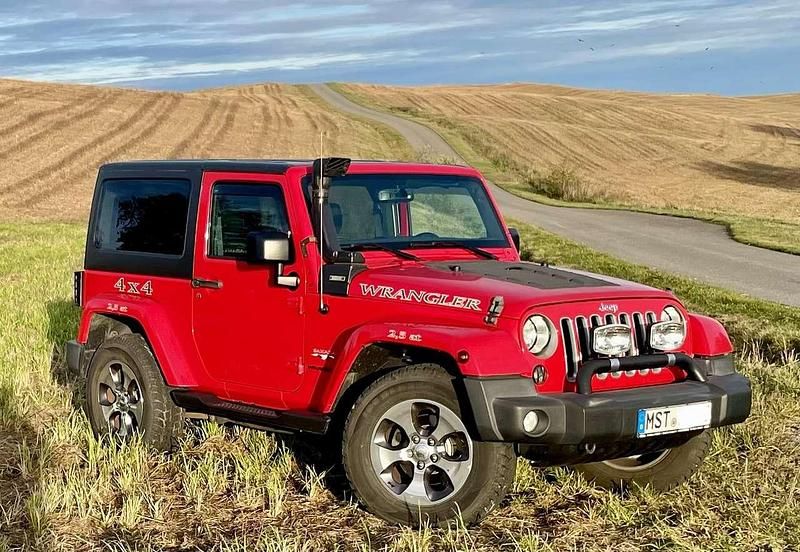 Rot Gebraucht 2016 Jeep Wrangler Sahara SUV | 33.333 € (Fairer Preis) - Bild 1/4