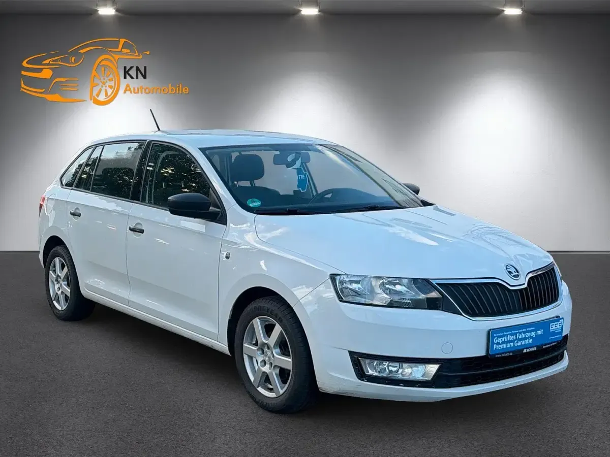 Używany Skoda Rapid 75 KM (55 kW) 2014 Biały Hatchback