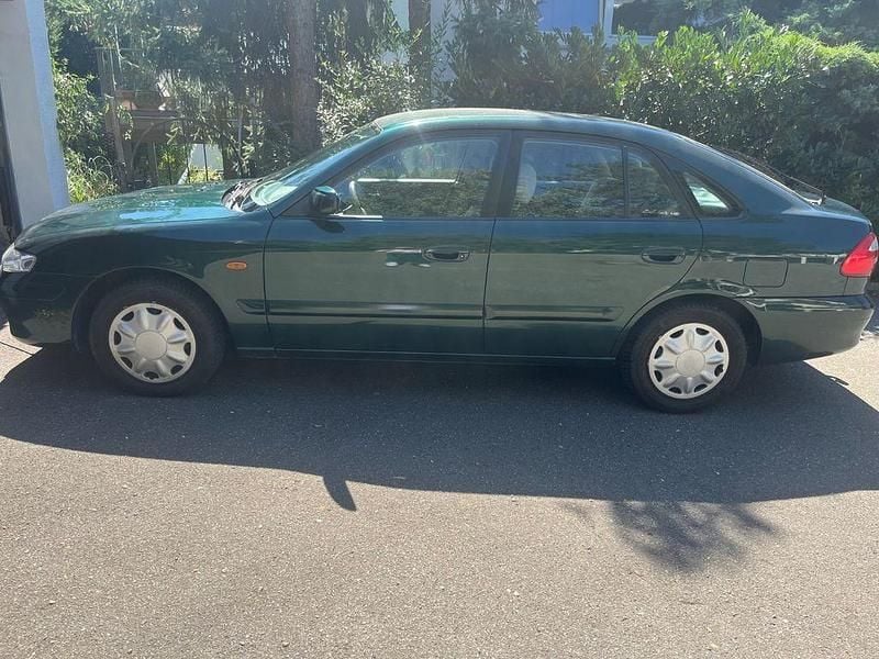 Grün Gebraucht 2000 Mazda 626 Sportive Limousine | 3.500 € (Fairer Preis) - Bild 1/4