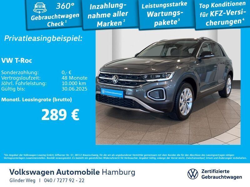 Indiumgrau metallic/schwarz Gebraucht 2024 VW T-Roc Style SUV | 32.390 € (Fairer Preis) - Bild 1/3
