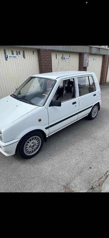 Gebraucht Daihatsu Cuore 41 PS (30 kW) 1989 Weiß Kleinwagen