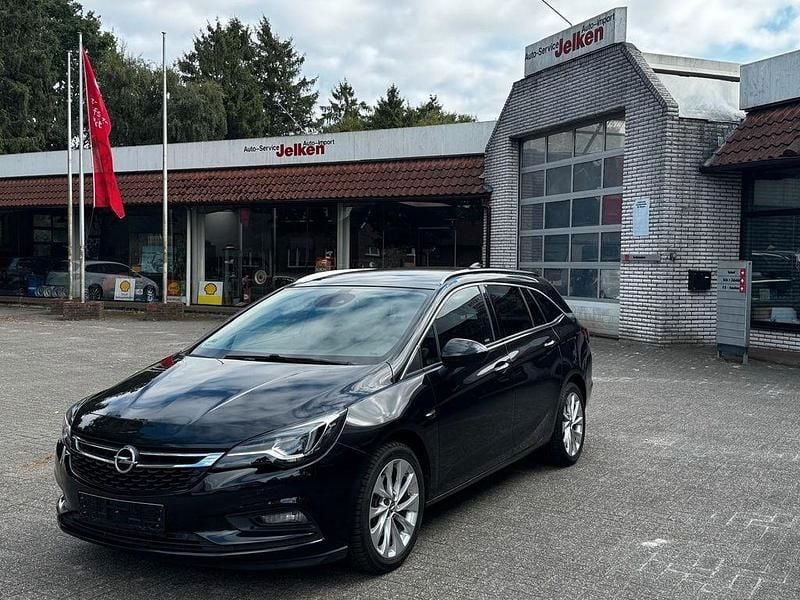 Schwarz Gebraucht 2016 Opel Astra Innovation Kombi | 10.999 € - Bild 1/4